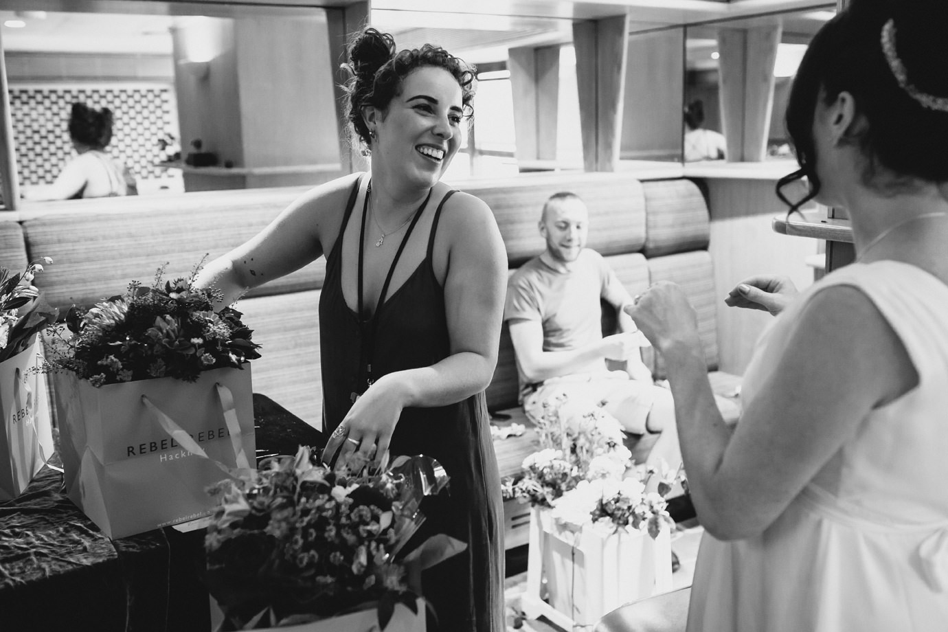Picking up the flowers, Southbank documentary wedding photography